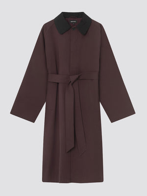 Stylish brown coat with a black collar and a belt, perfect for layering. Designed by MEOTINE for a chic look.