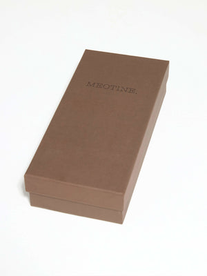 Brown rectangular box with a minimalist design, featuring the brand name "MEOTINE" elegantly embossed on the top.